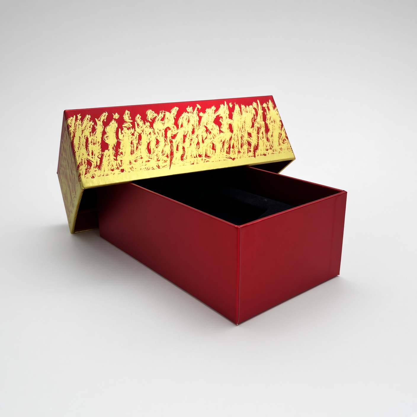 Red lid-and-base box with a gold and red pattern