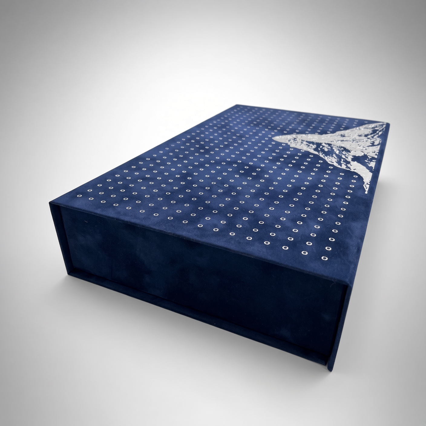 Dark blue velvet premium box with silver foil stamping