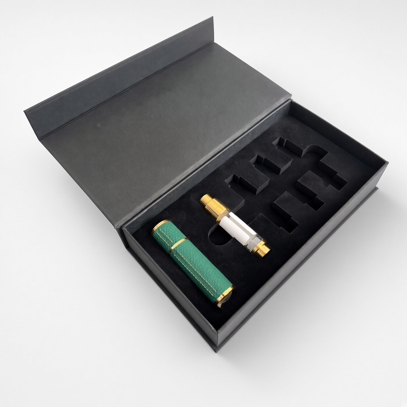 Black magnetic box with a black insert for small bottles